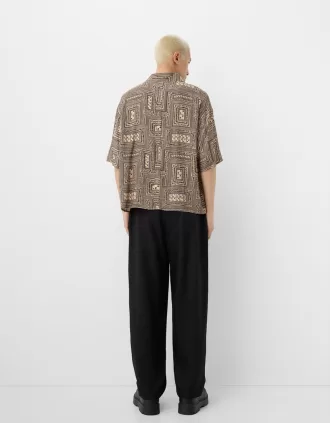 Camisa boxy fit manga corta estampada Sand