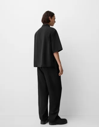 Camisa cruzada boxy fit de manga corta con hebilla Black