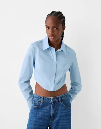 Camisa entallada de rayas con manga larga. Blue