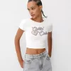 Camiseta espalda abierta con pedrería Cream