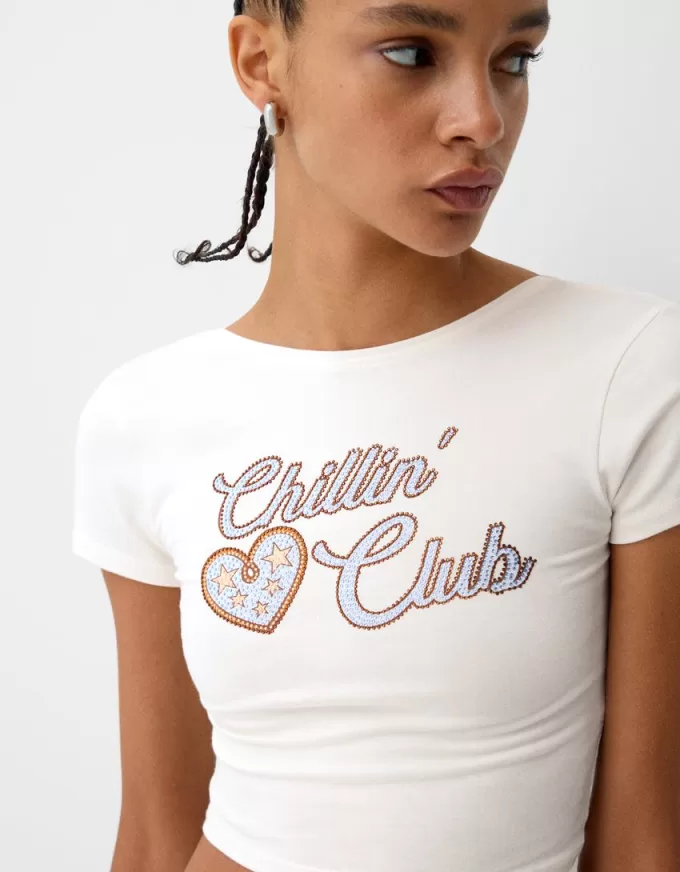 Camiseta espalda abierta con pedrería Cream