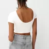 Camiseta espalda abierta con pedrería Cream