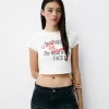 Camiseta estampada con manga corta raglán Cream
