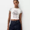 Camiseta estampada con manga corta raglán Off white