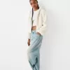 Chaqueta acolchada con capucha de pelo sintético Off white