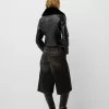 Chaqueta entallada efecto piel con cuello de material sudadera Black