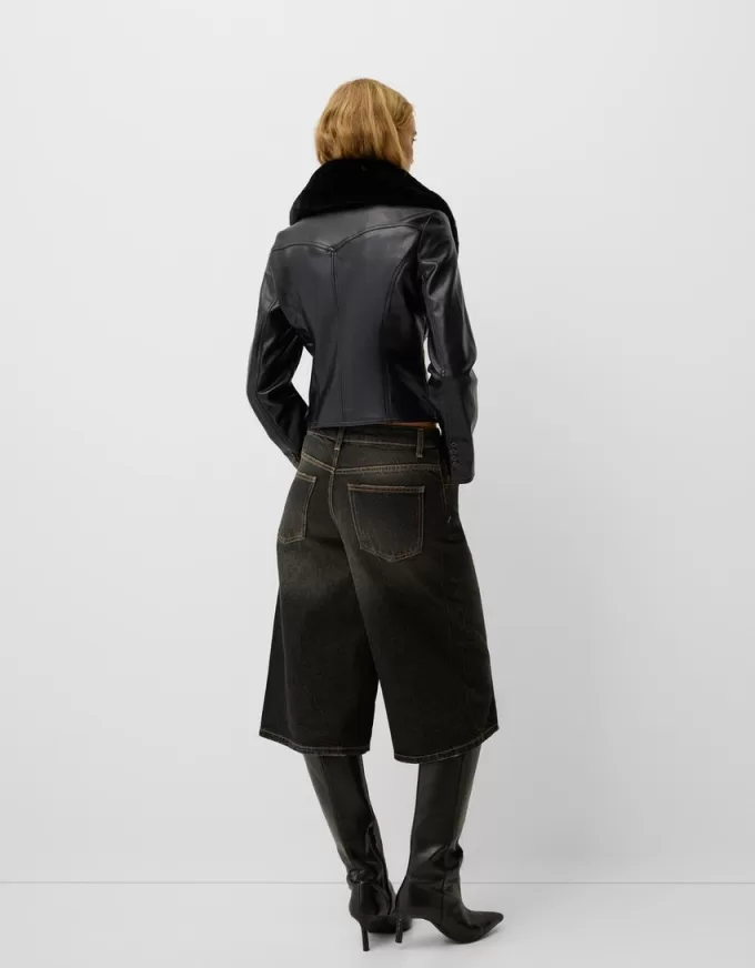 Chaqueta entallada efecto piel con cuello de material sudadera Black