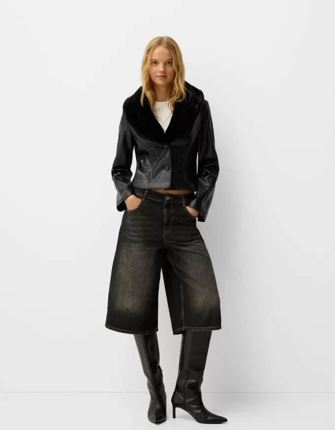 Chaqueta entallada efecto piel con cuello de material sudadera Black