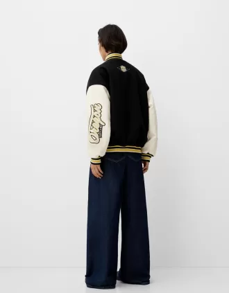 Chaqueta universitaria con mangas en contraste Black