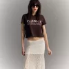 Falda midi de encaje Off white