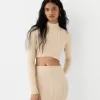 Falda midi de punto trenzado Sand