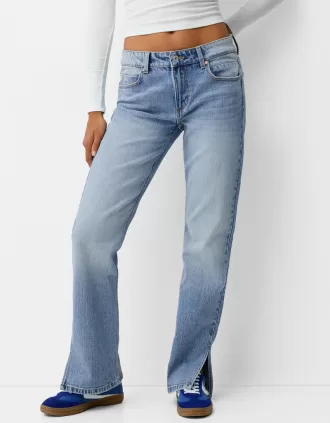 Jeans acampanados con dobladillo dividido Light blue