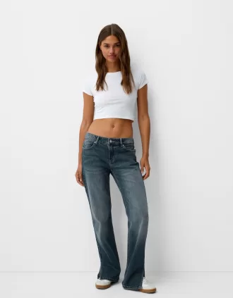 Jeans acampanados con dobladillo dividido Washed out blue