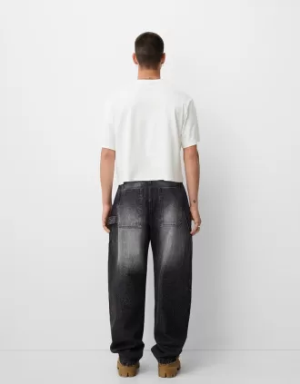 Jeans baggy con corte globo Black