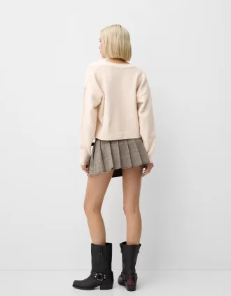 Jersey corto con cuello en V Sand