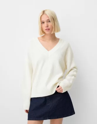 Jersey oversize con cuello de pico Cream