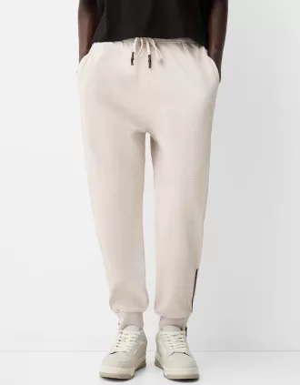 Joggers con cremalleras Sand