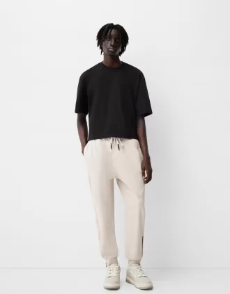 Joggers con cremalleras Sand