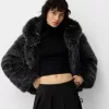 Minifalda con pliegues y detalle de lazo Black