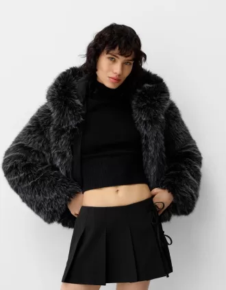 Minifalda con pliegues y detalle de lazo Black