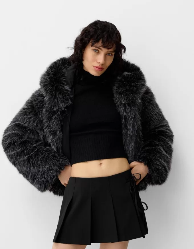 Minifalda con pliegues y detalle de lazo Black