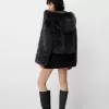 Minifalda con pliegues y detalle de lazo Black