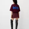 Minifalda con pliegues y detalle de lazo Maroon