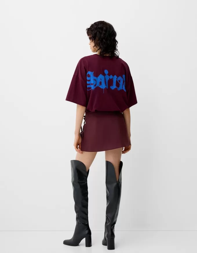 Minifalda con pliegues y detalle de lazo Maroon