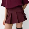 Minifalda con pliegues y detalle de lazo Maroon