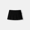 Minifalda con pliegues y detalle de lazo Black
