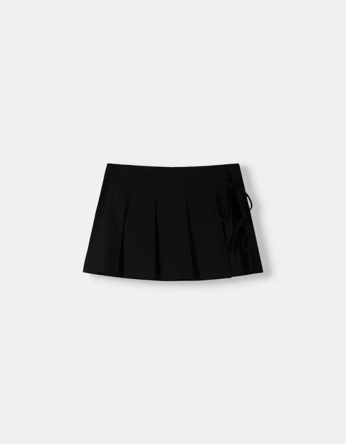 Minifalda con pliegues y detalle de lazo Black