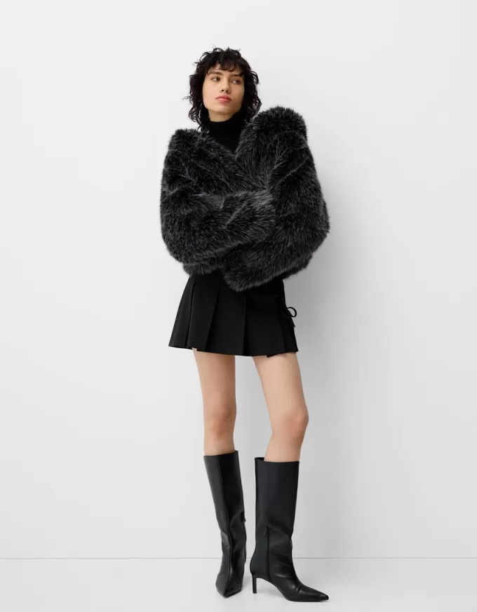 Minifalda con pliegues y detalle de lazo Black