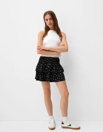 Minifalda con volantes y cintura elástica Black