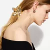 Pack de 2 pasadores para el pelo con flores metalizadas Gold Pack de 2 pasadores para el pelo con flores metalizadas Gold