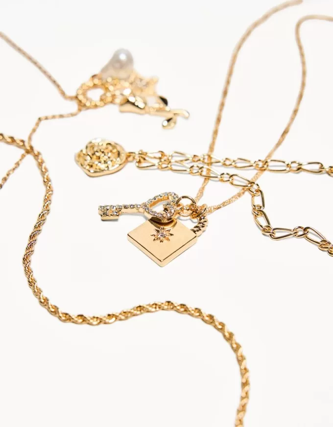 Pack de 4 collares con colgantes Gold Pack de 4 collares con colgantes Gold