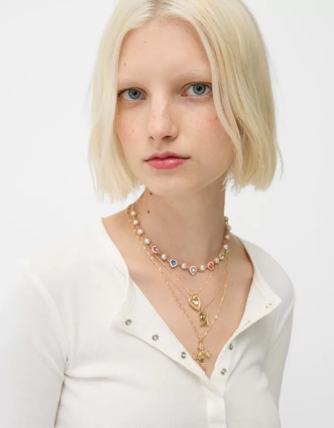 Pack de 4 collares con cruces de strass Gold