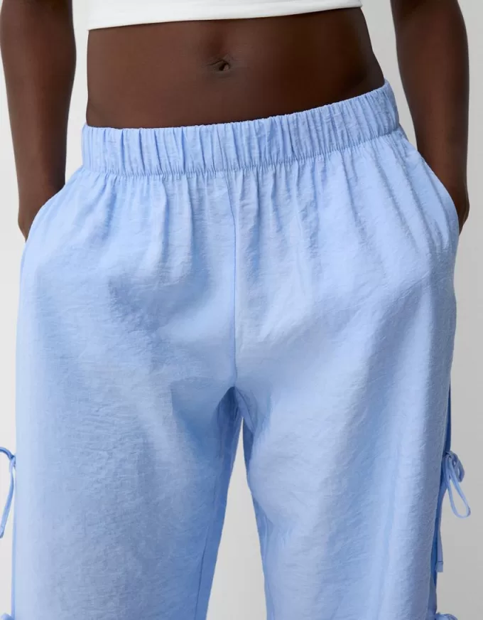 Pantalón fluido con lazos laterales Light blue