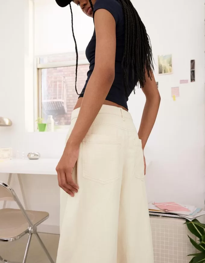 Pantalón fluido con pinzas Beige