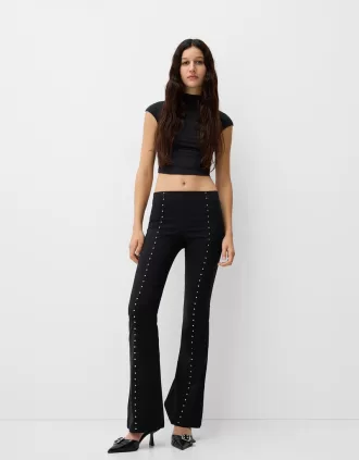Pantalones acampanados con tachuelas Black