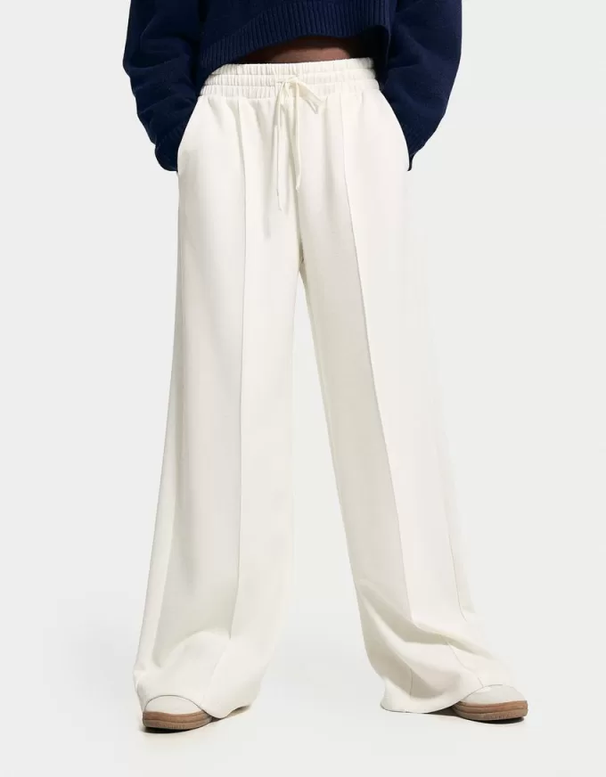 Pantalones anchos suaves Cream