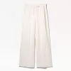 Pantalones anchos suaves Cream