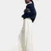 Pantalones anchos suaves Cream