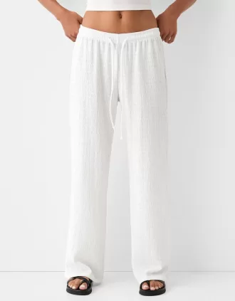 Pantalones rectos con punto waffle Off white