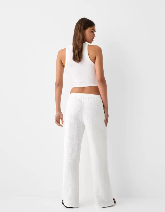 Pantalones rectos con punto waffle Off white