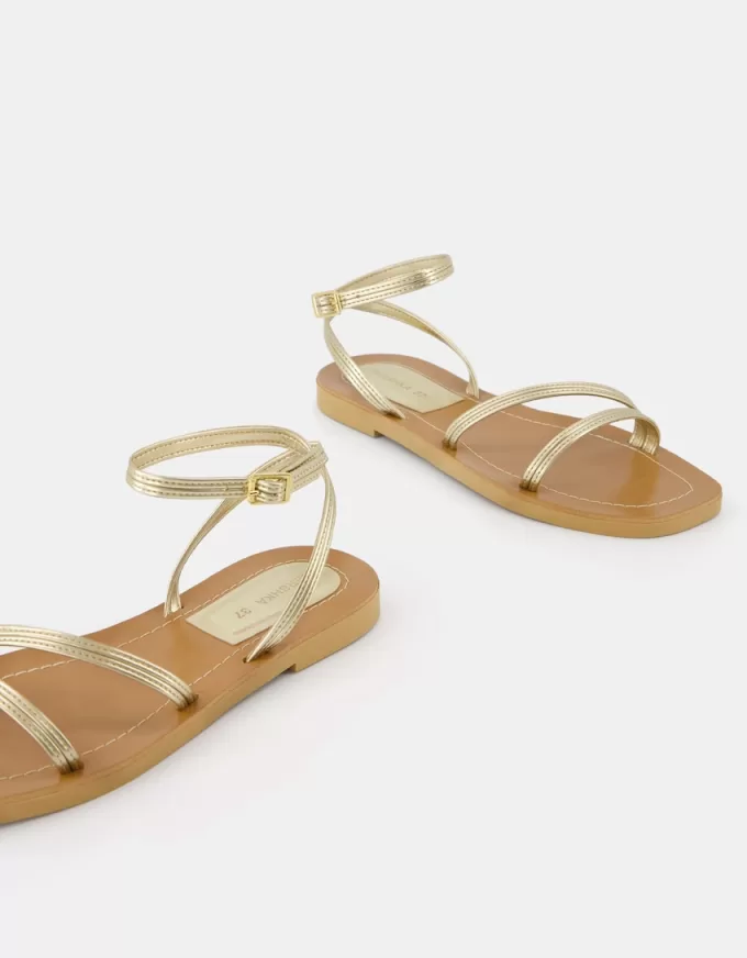 Sandalias planas con tira metalizada Gold Sandalias planas con tira metalizada Gold