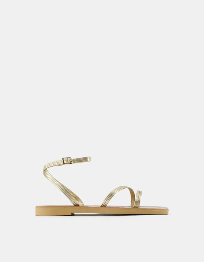 Sandalias planas con tira metalizada Gold Sandalias planas con tira metalizada Gold