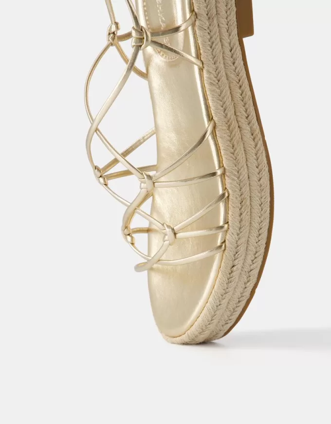 Sandalias planas de yute atadas Gold Sandalias planas de yute atadas Gold