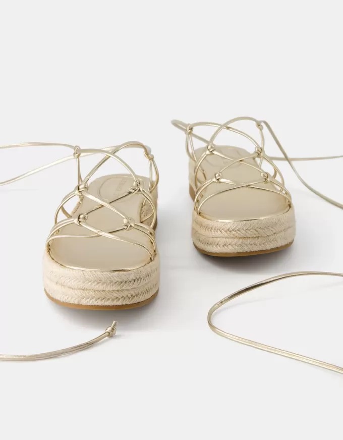 Sandalias planas de yute atadas Gold Sandalias planas de yute atadas Gold