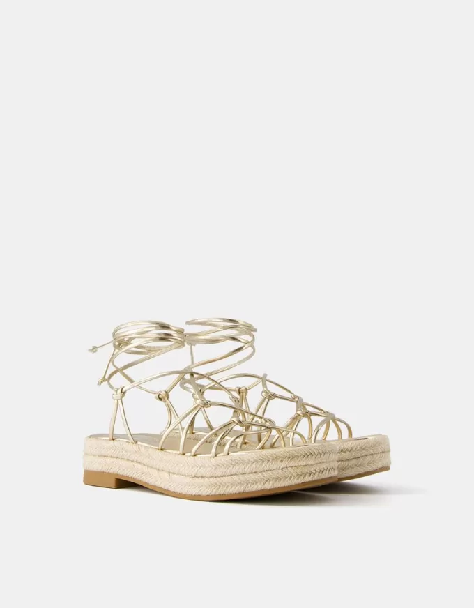 Sandalias planas de yute atadas Gold Sandalias planas de yute atadas Gold