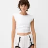 Shorts de encaje satinado Off white